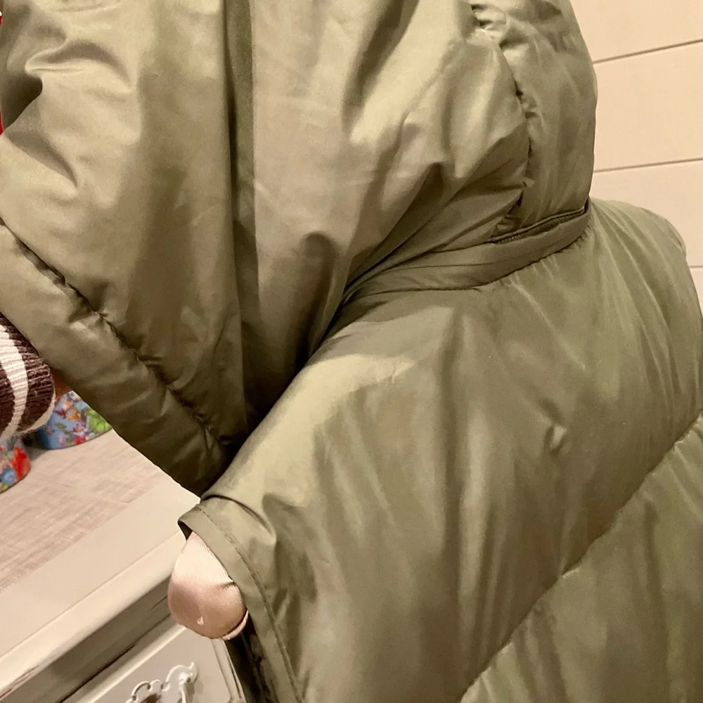 Olive Green Puffer Vest mid size. - Picture 5 of 9